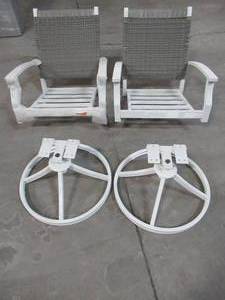 lot 340 image: Hampton Bay Jasper Ridge White Galvanized Steel w Wicker Back Swivel Captain Outdoor Dining Chair w Blue Standard Cushion (2-Pack), 2026-DMI-WW - Missing Hardware and have some slight scratcheswicker cuts.