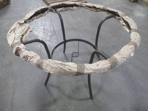lot 204 image: Wicker Wound Round Patio Table 42 in dia X 29 12 Tall - Missing Glass.