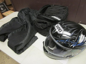 lot 252 image: SHOEI MOTORCYLE HELMET, ROADGEAR MOTOROCYCLE PANTS, HELMET BAG