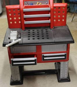 Childs tool box with tools...