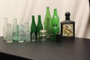 21 green bottles, a Jeam Beam bottl...