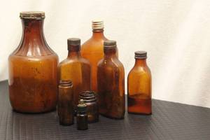 8 brown bottles, ...