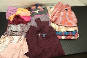 size S, over a dozen tops...