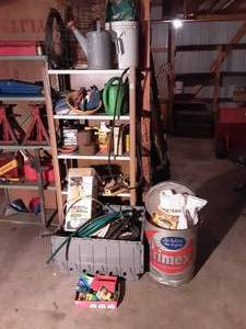 Shelf Full Of Garden Supplies