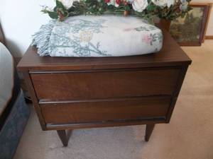 lot 23 image: 2-Drawer Night Stand With A Nice Throw & Floral Arrangement  15x24x22T