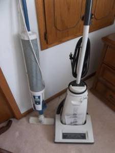 lot 36 image: Riccar N2000 Vacuum Cleaner With Manual & Regina Electric Broom Both Working