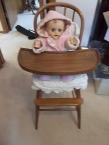 lot 42 image: Baby Doll In High Chair