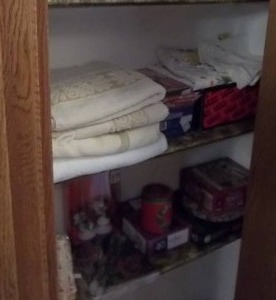 lot 55 image: Contents Of Linen Closet-Towels, First Aid & Games
