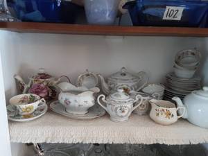 lot 132 image: Shelf Of Floral Tea Cups, Pots & Saucers