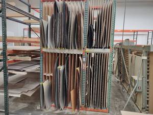 lot 74 image: Laminate Rack with Assorted Laminat...