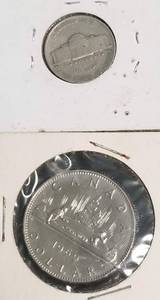 lot 34 image: 2 COINS 1969 CANADA DOLLAR 1939 JEFFERSON NICKEL