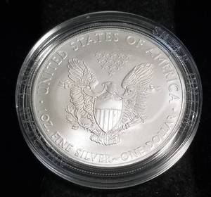 lot 27-A image: 2010 AMERICAN SILVER EAGLE 1 TROY OZ. .999 FINE SILVER IN ORIGINAL PACKAGING