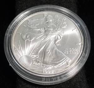 lot 11-A image: 1998 AMERICAN SILVER EAGLE 1 TROY OZ. .999 FINE SILVER IN AIRTITE