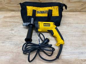 lot 44 image: DEWALT 7.8 Amp Corded 12 in. Variable Speed Reversible Hammer Drill with Bag