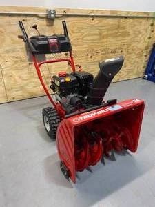 lot 3 image: TROY-BILT 24 in. 208 cc Two-Stage Gas Snow Blower with Electric Start Self Propelled
