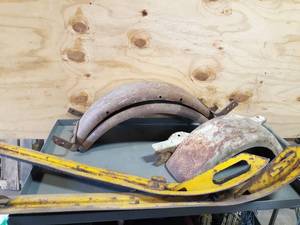 lot 714 image: Steel Trailer Fenders and (2) Vintage Snowmobile Skis