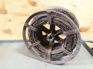 lot 718 image: Vintage Corn Planter Check Wire Roll