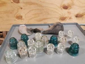 lot 723 image: (18) Vintage Glass Insulators, Prop and Bicycle Seat