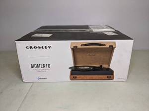 lot 11 image: Crosley Momento Bluetooth Portable Suitcase Record Player with 3-speed Turntable