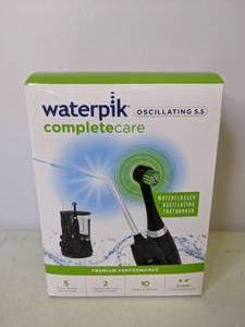 lot 153 image: Waterpik Oscillating 5.5 Complete Care Water Flosser