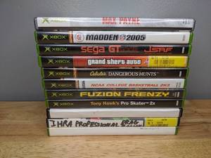 lot 162 image: 11 XBOX Games Grand Theft Auto Madden Max Payne 50 Cent
