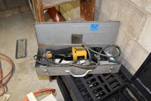 lot 14 image: Ingersoll-Rand Miller Falls Super Saw SP9770 with Metal Case