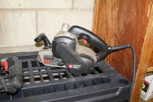lot 17 image: Porter-Cable Variable Speed Belt Sander with Dust Collection 3x21 352VS