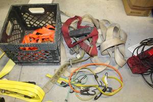lot 76 image: Orange Nylon Straps (x3), Heavy Duty Nylon Strap (x1), Bungee Cords, Climbing Belt, Safety Harness