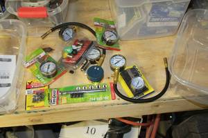 lot 150 image: Tire Pressure Dial Gauges, Pressure Washer Heads, Tire Gauge, Valve Stem Covers