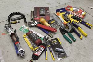 lot 203 image: Lot of Hand Tools (new) - Crescent Wrench, EZ Tool Multi-Socket Wrench, Vise Grip Pliers, Chisel, Drill Bits, And More