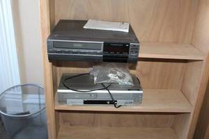 lot 267 image: Lot of (2) Electronics - Sylvania VCR & DVDCD Player, RCA HQ VCR Recorder