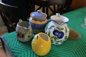 lot 291 image: Lot of (6) Table Dcor - Ceramic Pitchers (x2), Sugar Bowl, Ceramic Cookie Jar with lid, Crystal Platter, Yellow M&M Jar