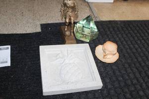 lot 299 image: Lot of (5) Home Dcor - Pineapple Plaque, Teac Cup and Saucer, Pyramid, Soccer Man