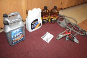 lot 392 image: Lot of (6) Automotive Chemicals and Accessories - Coolant (x2), Diesel Treatment (x2), 15W-40 Diesel Oil (x1), Jumper Cables (x1)