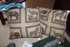 lot 395 image: Lot of (2) Animal Print Throw Pillows 20x20