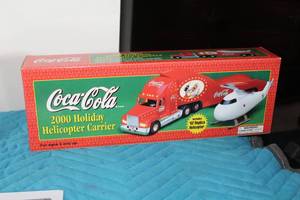 lot 366 image: Coca-Cola 2000 Holiday Helicopter Carrier with 1962 Replica Helicopter Limited Edition Collectible (in box)