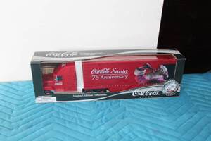 lot 368 image: Coca-Cola Santa 75th Anniversary Semi Tractor Trailer Limited Edition Collectible (in box)