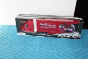 lot 370 image: Coca-Cola Santa 75th Anniversary Semi Tractor Trailer Limited Edition Collectible (in box)