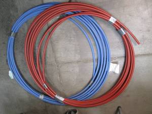 lot 78 image: 2 large rolls of color coded pex wa...