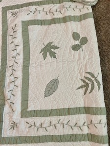 lot 162 image: White Twin Quilt with Decorative Leaf Design with Pillow Shams