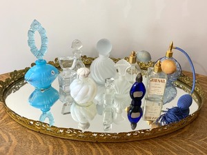 lot 89 image: Large Oval Mirrored Vanity Tray and Vintage Perfume Bottles