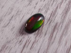 lot 40Q image: Flashy 1.59 Carat Natural Black Opal