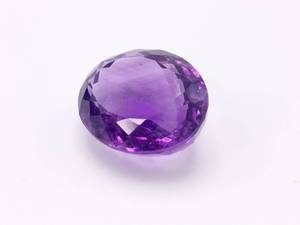 lot 50O image: 10.25 Striated Deep Amethyst Fancy Oval Cut