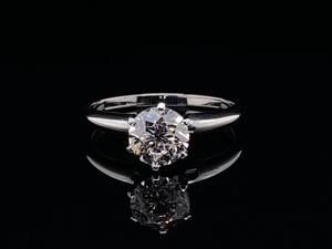 lot 12 image: Tiffany & Co Styled 1.10 Carat Diamond Solitaire Estate Ring in 14k White Gold with GSK Report $8,850 Appraisal