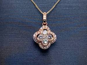 lot 35 image: Van Cleef and Aprels Alhambra Styled High Grade Diamond Pendant in 14k Rose Gold $2,750 Retail