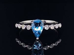 lot 44 image: Deep Blue Natural Aquamarine and Bezel Set Diamond Ring in 14k White Gold $2,850 Retail