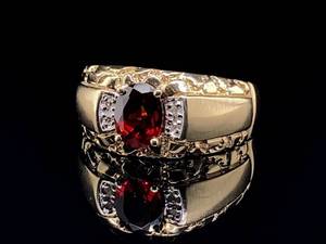 lot 67 image: Mens Rich Garnet and Diamond Gold Nugget Styled Estate Ring in Yellow Gold $1,625 Retail