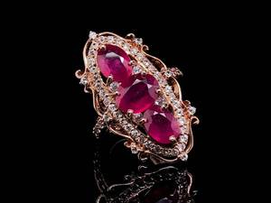 lot 92 image: Spectacular 3 Carat Ruby and White Topaz Statement Ring