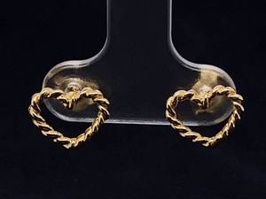 lot 79 image: Beautiful 14k Yellow Gold Eternal Heart Twist Earrings