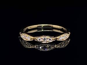 lot 73 image: Lovely Diamond Wave Band in 14k Yellow Gold $1,550 Retail